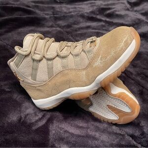Jordan 11 Retro (Women’s size 6.5, fit of a 7).